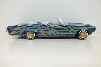 Chevrolet Impala 1965 convertible Low Rider Hot Wheels 1:18 fundido a presión Foto 1 de 4
