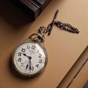 ELGIN 571 BW Raymond 21j 16s 1951 - estuche 10 k GF J Boss, grado RR - reparado - Imagen 1 de 5