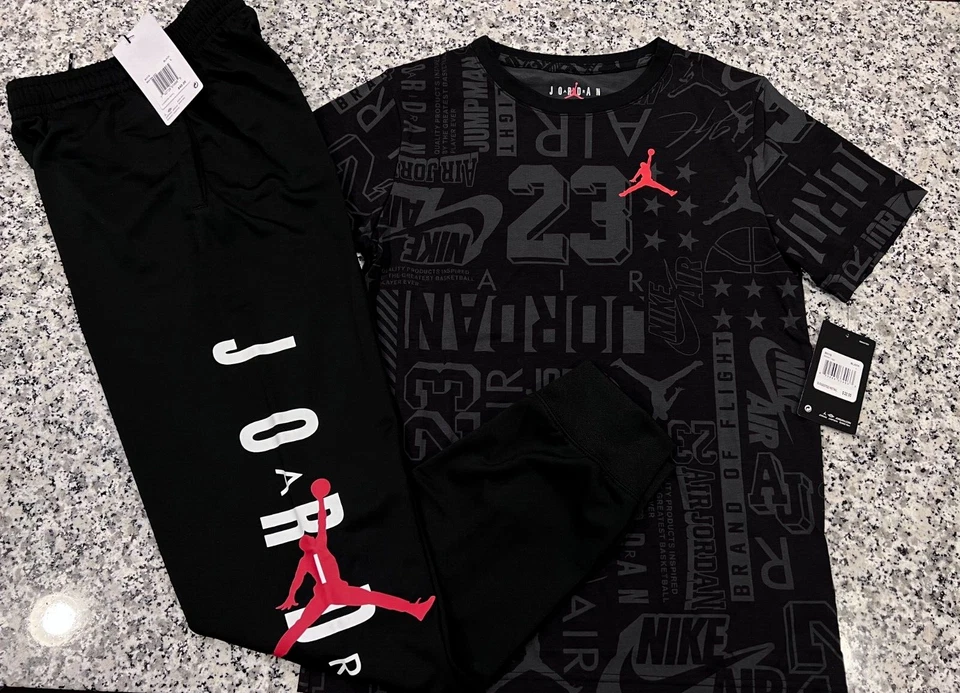NUEVO CON ETIQUETAS NIKE AIR JORDAN JUEGO DE 2 PIEZAS NEGRO MANGA CORTA Y JOGGERS ACTIVOS L 12-13 Foto 1 de 1