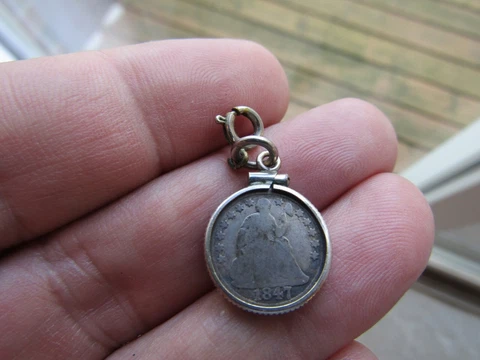 1847 SEATED LIBERTY HALF DIME, ENCLOSED WITH SILVER BEZEL, NECKLACE ATTACHMENT Cover