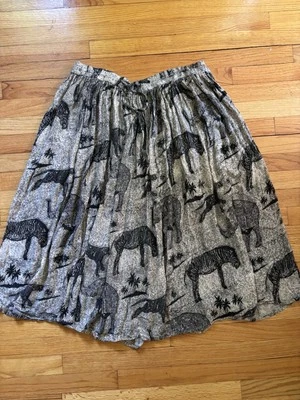 FALDA MIDI PHOOL CRINKLE RAYON ESCOBA ANIMALES DE SAFARI, PEQUEÑA Foto 1 de 4