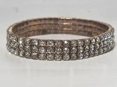 Brazalete tenis elástico tres filas tono oro rosa estrás circonita cúbica  Foto 1 de 4