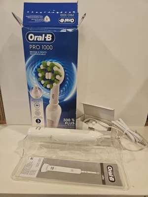 Oral-B Pro 1000 белый аккумуляторная электрическая зубная щетка и зарядное устройство основание - без головки- - Изображение 1 из 4