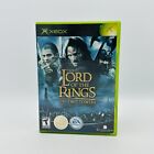 El Señor de los Anillos: Las Dos Torres (Microsoft Xbox, 2002) en caja original con guía de estrategia