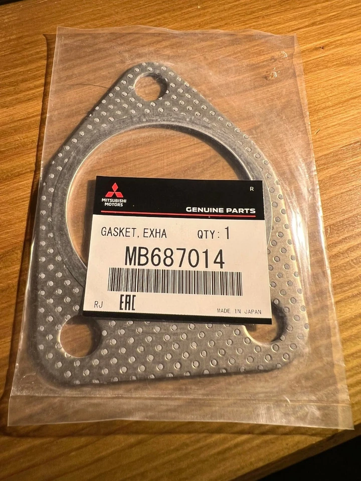 Genuine OEM Mitsubishi exhaust gasket. Brand new. MB687014 - Image 1 of 1