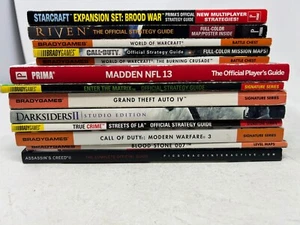 Lot Of 12 Video Game Books/Guides -GTA Call od duty world of warcraft madden - Picture 1 of 2