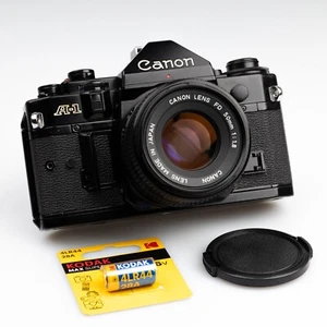 *TOP* SERVICED Canon A-1 Black Classic 35mm Film Camera FD 1.8 50mm Lens JAPAN - Picture 1 of 15
