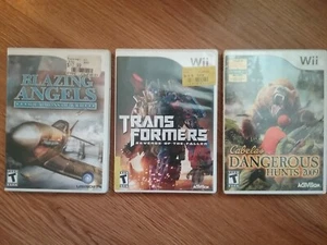 Konvolut 3 Wii Spiele Transformers Revenge Of The Fallen Blazing Angels Cabela's - Bild 1 von 5