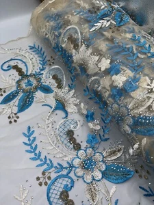 "Tela de red de tul festoneado tachonado bordado marfil/turquesa 52"" 1 mtr" - Imagen 1 de 5