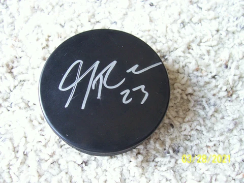 Kalamazoo Michigan Wings Hockey Left Wing Player #23 Garret Ross Signed Puck Cover