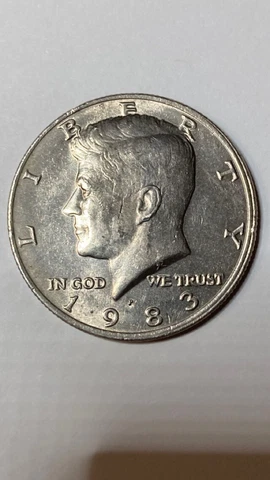 1983 P Kennedy Half Dollar Error Coin Obverse Struck Off Center Cover