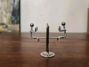 Péndulo de equilibrio de metal cinético oscilando personas  - Imagen 1 de 8