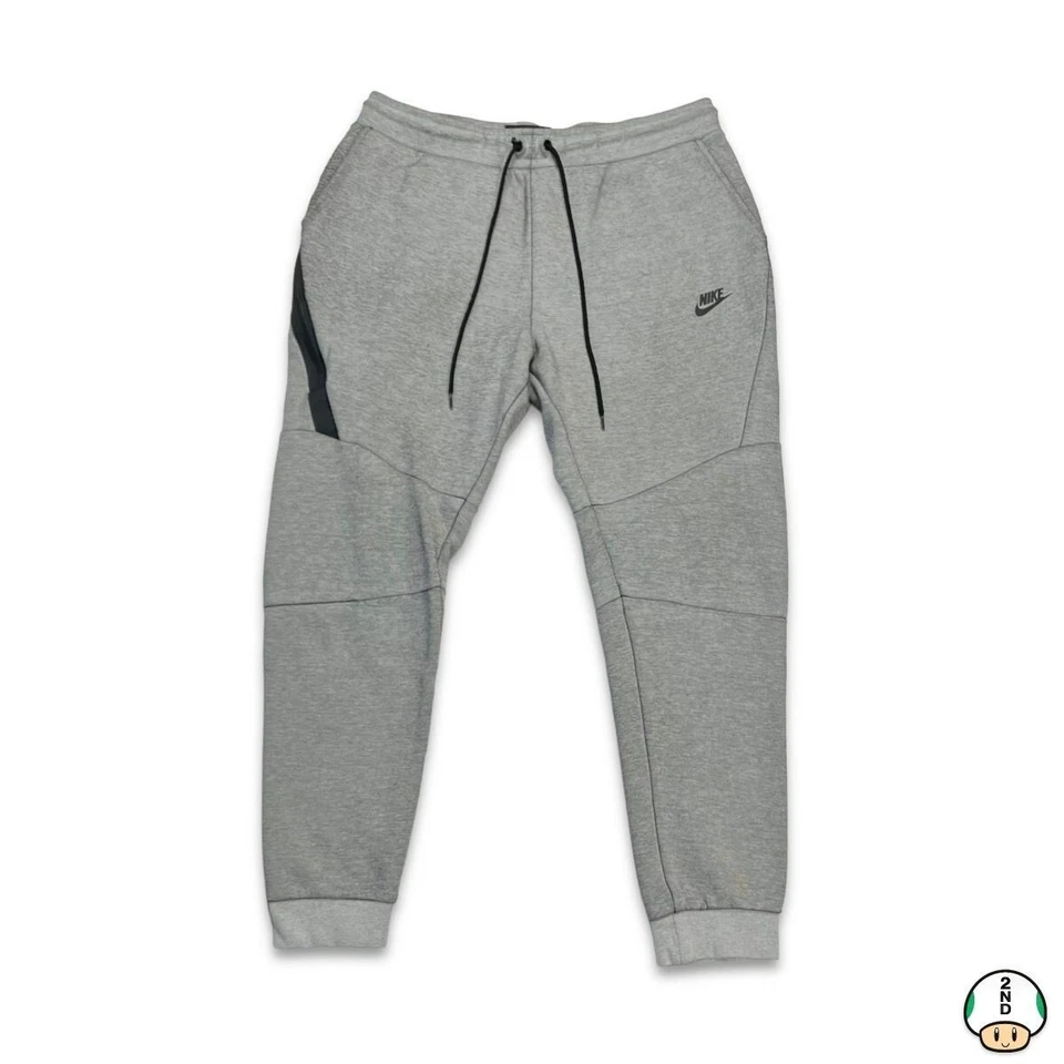 Pantalones deportivos Nike Sportswear para hombre grandes grises Swoosh Tech polar atléticos jogger Foto 1 de 4