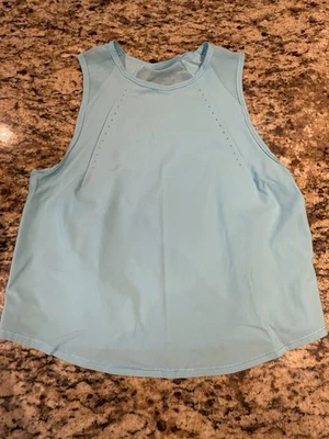 Camiseta sin mangas Lululemon recortada esculpida talla 4 (color azul agua) Foto 1 de 3