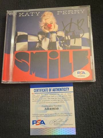 KATY PERRY SIGNED SMILE CD SOLD OUT AMERICAN IDOL PSADNA AUTHENTICATED #AH48650 Cover
