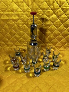 VINTAGE MCM LIQUOR DIPENSER WITH PUMP AND 12 SHOT GLASSES - Picture 1 of 5