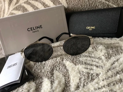 Gafas de sol ovaladas Triomphe plateadas/grises Celine CL40235U para mujer Foto 1 de 3