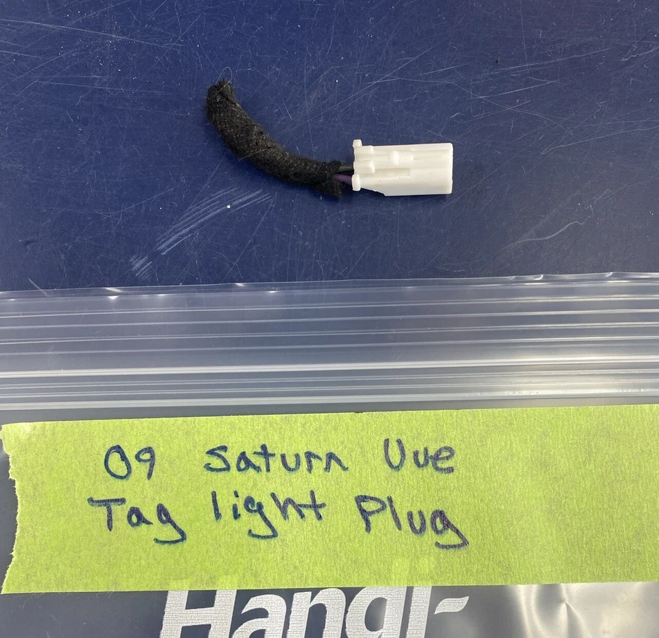 Enchufe de luz de etiqueta 09 SATURN VUE Foto 1 de 1