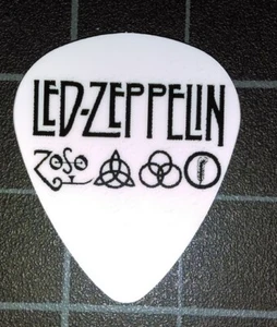 LED ZEPPELIN ZOSO LOGO SYMBOLE GITARRENPLEKTREN 4er SET - Bild 1 von 3
