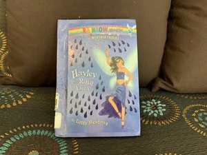 Hayley the Rain Fairy (Rainbow Magic: The Weather Fairies #7) by Daisy Meadows - Picture 1 of 12
