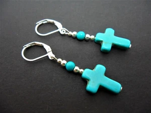 A PAIR OF TURQUOISE BLUE  SILVER PLATED CROSS LEVERBACK HOOK EARRINGS. NEW. - Picture 1 of 1