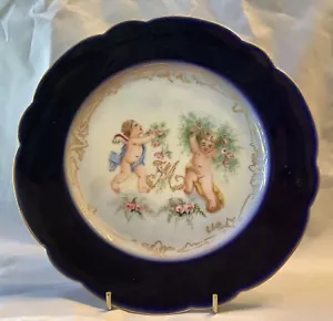 Limoges Francia D & C Placa Cobalto Oro Borde Putti Querubín y Rosas Firmado - Imagen 1 de 10