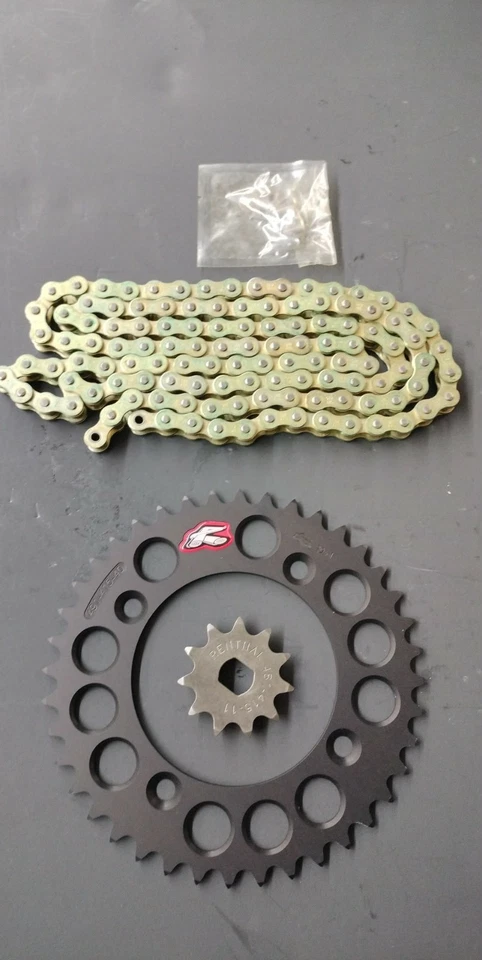 Комплект зубьев звездочки 40/11 KTM 50 SX Mini Renthal и комплект золотой цепи SRT 14-2020 годов выпуска - Изображение 1 из 1