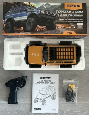 FMS 1:18 FCX18 LC80 Toyota Land Cruiser LC80 RTR gelb leicht gebraucht LC80 L3 - Bild 1 von 4