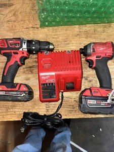 Milwaukee M18 18-Volt Lithium-Ion Brushless Cordless Compact Drill/Impact Combo - Picture 1 of 7