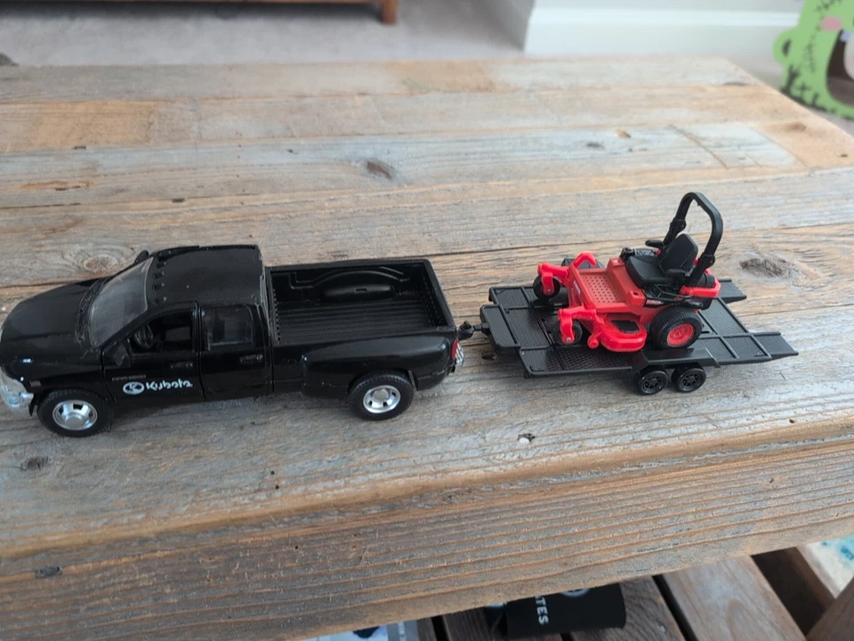 Kubota Truck Zero Turn Mower With Trailer  Ram 3500 New Ray Toy - Image 1 of 4
