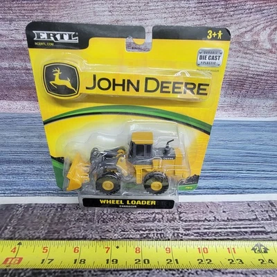 Cargadora de ruedas John Deere ERTL 2006 37014 escala 1:50 equipo construcción sellado Foto 1 de 4