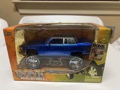 JADA DONK BOX & BUBBLE 1985 CADILLAC BROUGHAM 1:24 BLUE Damaged - Image 1 of 4