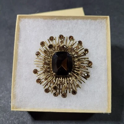 Broche Vintage Tonificado Dorado con Vidrio Ámbar Centro Piedra Flor Ráfaga Atómica Foto 1 de 4
