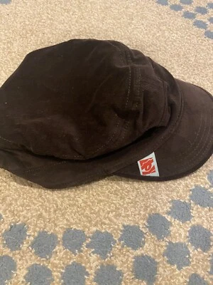 Sombrero clásico de ciclismo Race Face para dama marrón pequeño Foto 1 de 4