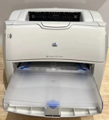 Refurbished! HP Laserjet 1200 printer Grade "A" w/Full Tray with installation CD - Image 1 of 3