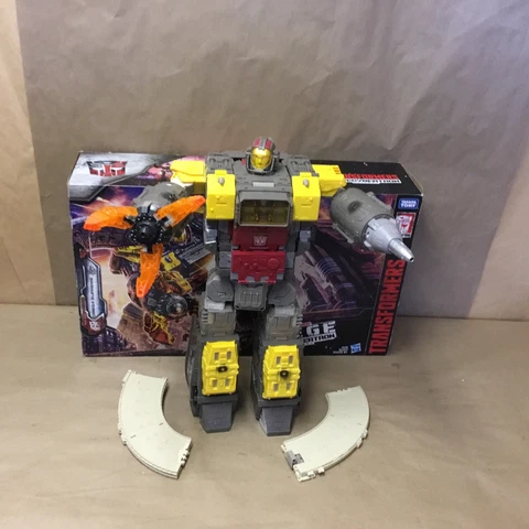 Transformers E4287 Toys Generations War Cybertron Titan WFC-S29 Omega Supreme Cover