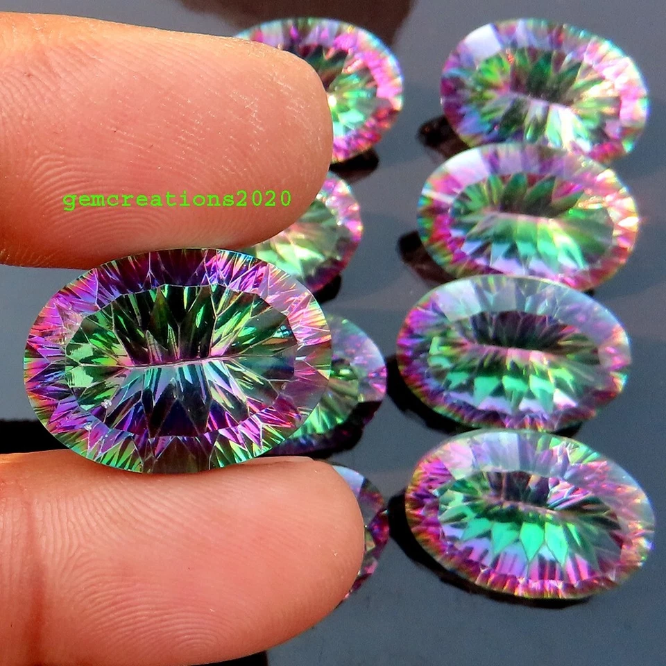 27-29.00 Carat. MYSTIC TOPAZ CONCAVE CUT OVAL CABOCHON GEMSTONES (15X21X10 MM) - Image 1 of 4