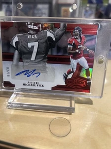 Placas y parches Panini 2023 - Marcas de carpa Michael Vick #MM-MV rojo 02/10 (AU) - Imagen 1 de 2