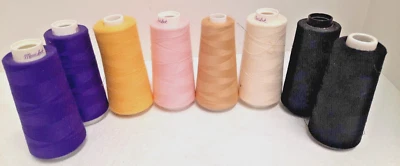 Lot of 8 Overlock Thread Cones Assorted Colors Open Used (at least 3/4 full) - Image 1 of 4