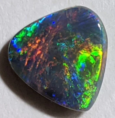 CLEFTLESS HEART 1,6 карата сплошной черный опал КРАСНЫЙ МНОГОЦВЕТНЫЙ Lightning Ridge! - Изображение 1 из 4