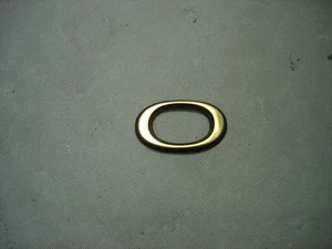 1998-2002 CADILLAC ELDORADO GOLD LOWER DOOR TRIM MOLDING SCRIPT LETTER "O" - Picture 1 of 3