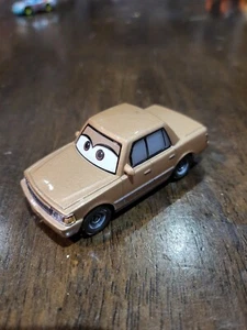 Mattel Disney Pixar Diecast Metal Cars Jen Tansedan Blue Desert Card Cotton Pin - Picture 1 of 3