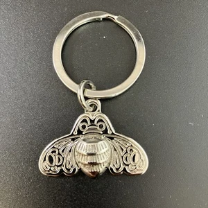 Portachiavi da collezione Patrón Tequila Bee logo tono argento 2 pollici nuovo con scatola - Foto 1 di 5