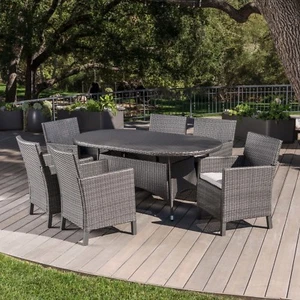 Cyril Outdoor 7 Piece Wicker Round Dining Set with Water Resistant Cushions - Picture 1 of 30