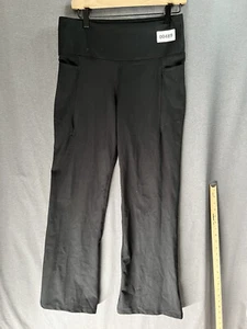 00489 [LIGERAMENTE USADO] JOCKEY NEGRO ACAMPANADO LEGGINGS CON BOLSILLOS TALLA L - Imagen 1 de 7