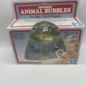Vintage NOS 1985 Shelcore 3 Pack Spinning Plastic Animal Bubbles Ball Bad Spielzeug - Bild 1 von 7