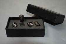 Premium Quality Stainless Steel Dust Caps In A Titanium Grey With a VW Logo