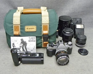 Pacchetto fotocamera Canon AE1 Program 35 mm 3 obiettivi unità motore flash extra funziona usato - Foto 1 di 20