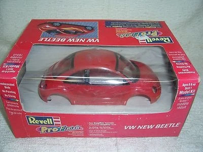 1/24 1999 VW NUEVO ESCARABAJO PREPINTADO ACABADO PROFESIONAL REVELL ROJO MODELO COCHE KIT-SIN USAR, EN CAJA Foto 1 de 4