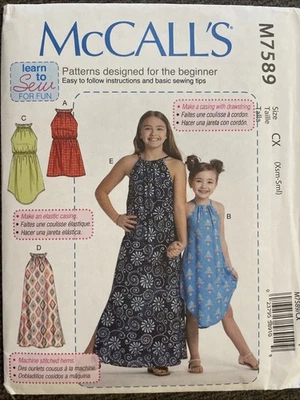 ~New Sewing Pattern McCall’s M7589 Children’s Girls Dresses XS-S - Image 1 of 4